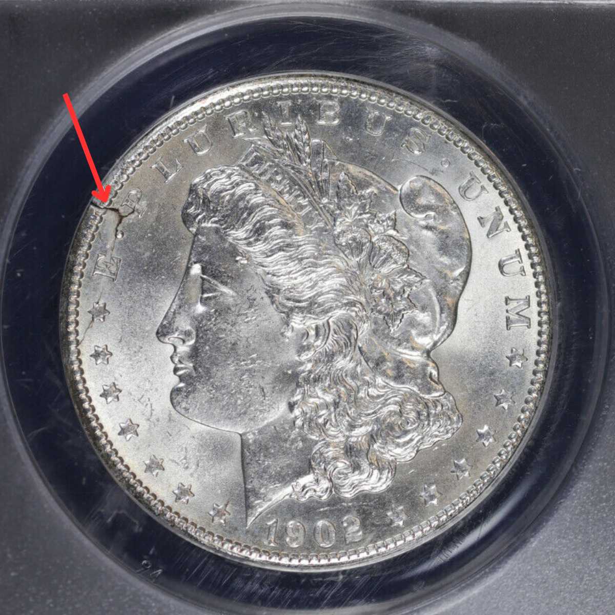 1902-O Silver Dollar Struck on Cracked Planchet